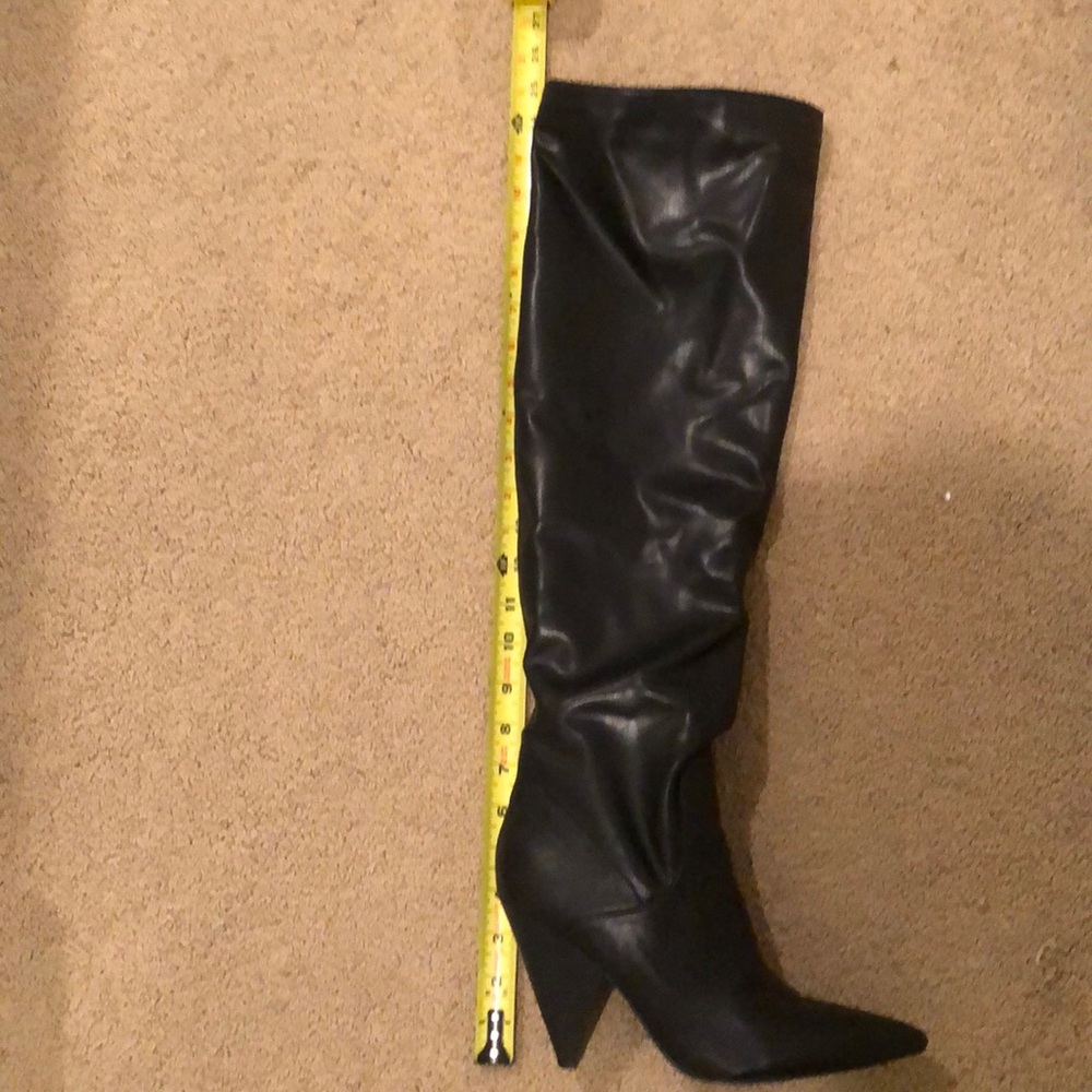 Black Thigh high boot w/slouch.